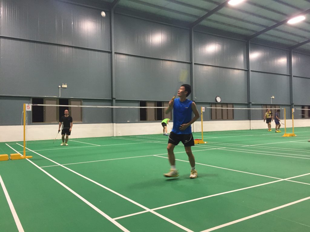 My teacher (in the blue) has amazing form. He can get across the court in three steps and seems to have an economy of movement. Every movement is so precise, every step thought out. I hope I can learn that. 